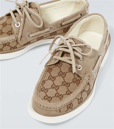 gg canvas boat shoes.